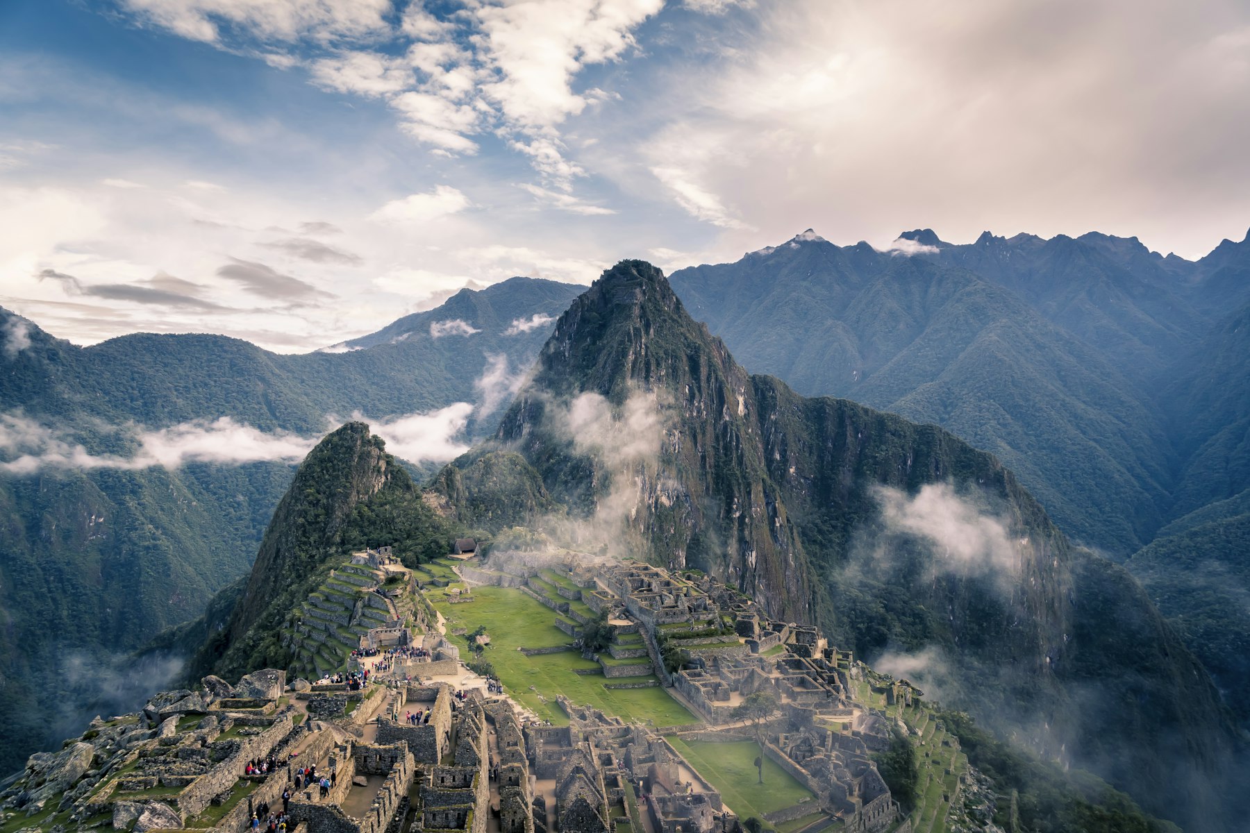 Machu Picchu, its dry-stone terraces intact on the ridge above the Urubamba valley.